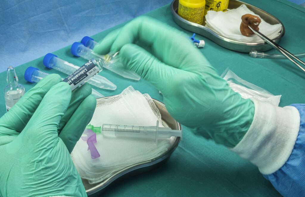 Nurse breaks anesthesia vial